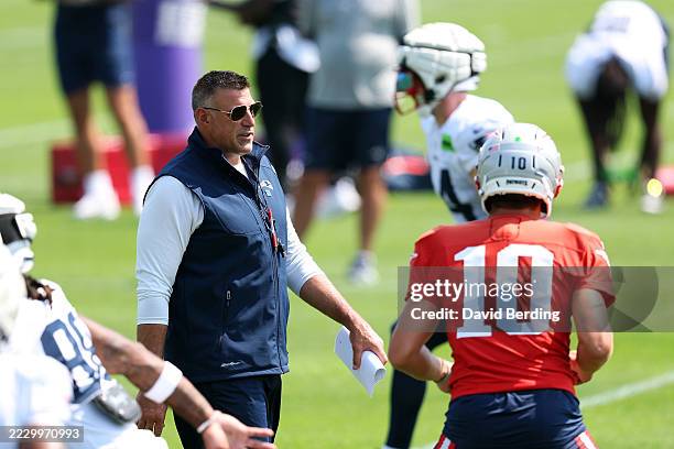 Head coach Mike Vrabel of the New England Patriots looks on during training camp at Twin Cities Orthopedics Performance Center on August 13, 2025 in...