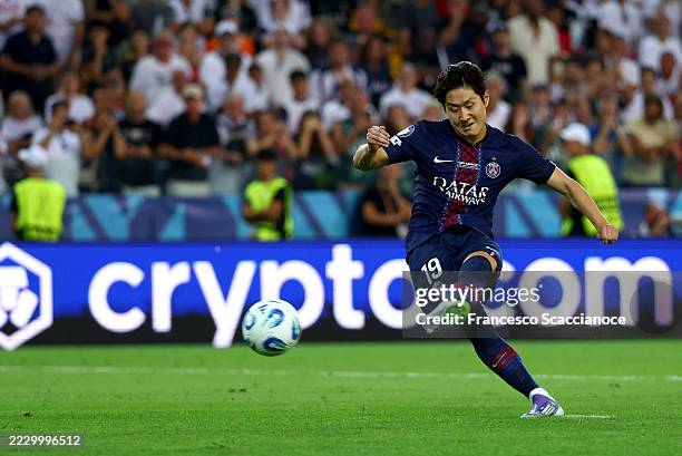 Lee Kang-In of Paris Saint-Germain scores the team's fourth penalty in the penalty shoot out during the UEFA Super Cup 2025 match between Paris...