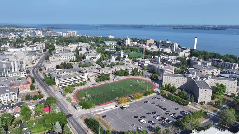https://media.gettyimages.com/id/2230009921/video/an-aerial-tour-of-queens-university-kingston-ontario.jpg?b=1&s=640x640&k=20&c=BiQtCXzNdb7eHRPeu4ovNvtA66FISpiEU2m3wXXt3vo=