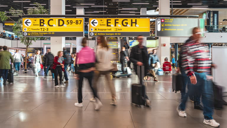 https://media.gettyimages.com/id/2230056344/video/4k-footage-time-lapse-long-exposure-of-crowded-commuter-people-in-tunnel-walkway-between.jpg?b=1&s=640x640&k=20&c=GbI194GNSaRYHIP1Lgz07c8hV16zcYaaw8l_c-k34-w=
