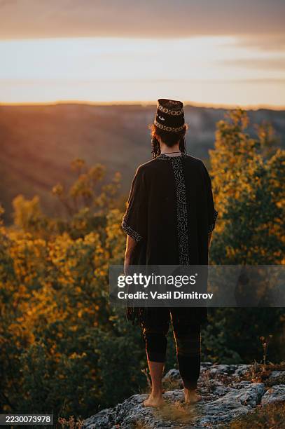 portrait photo of a shaman. mysterious man in the nature - traditional native american medicine stock pictures, royalty-free photos & images