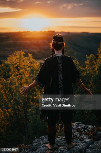 portrait photo of a shaman. mysterious man in the nature - traditional native american medicine stock pictures, royalty-free photos & images
