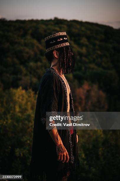 portrait photo of a shaman. mysterious man in the nature - traditional native american medicine stock pictures, royalty-free photos & images