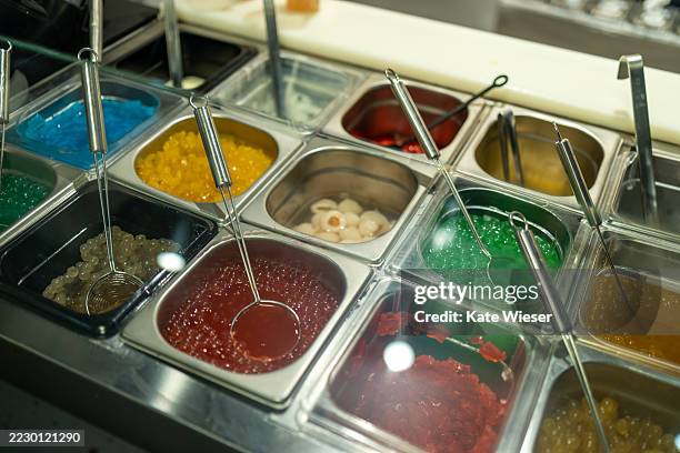 bubble tea preparation. colored tapioca pearls - tapioca balls stock pictures, royalty-free photos & images