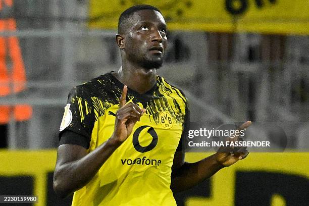Dortmund's Guinean forward Serhou Guirassy celebrates scoring the opening goal during the German Cup first round football match between Rot-Weiss...