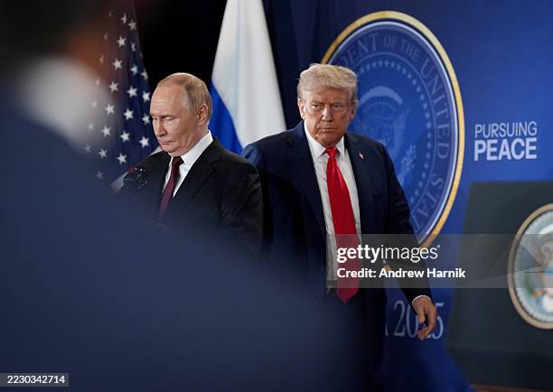 President Donald Trump and Russian President Vladimir Putin arrive for a press conference at Joint Base Elmendorf-Richardson on August 15, 2025 in...