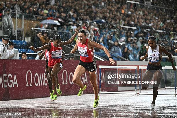 Netherlands' Nadine Visser crosses the finish line to win the women's 100m hurdles event of the IAAF Diamond League athletics meeting "Athletissima"...