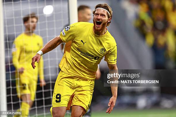 Bodoe/Glimt's Danish forward Kasper Hogh celebrates scoring his team's first goal during the play-off first leg UEFA Champions League football match...