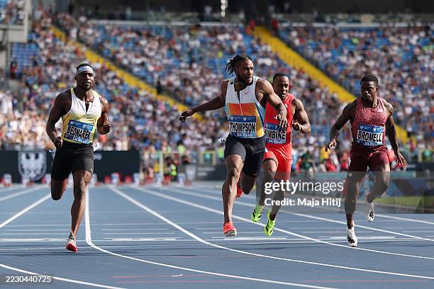 Kishane Thompson of Team Jamaica crosses the finish line before Kenneth Bednarek of Team United States, Akani Simbine of Team South Africa and...