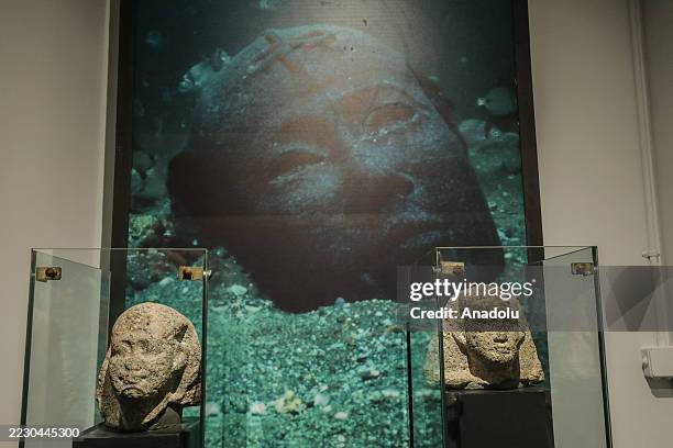 Rare statues and pottery, recovered from the depths of the Mediterranean, are displayed during the Secrets of the Sunken City exhibition at the...