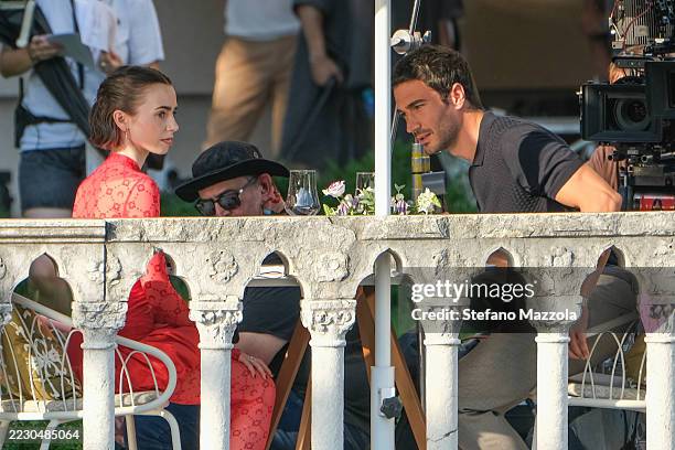 Lily Collins and Eugenio Franceschini are seen filming on the set of "Emily In Paris" on August 16, 2025 in Venice, Italy.