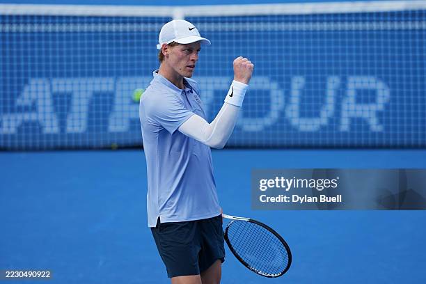 Jannik Sinner of Italy celebrates after beating Térence Atmane of France 7-6, 6-2 during Day 10 of the Cincinnati Open at the Lindner Family Tennis...