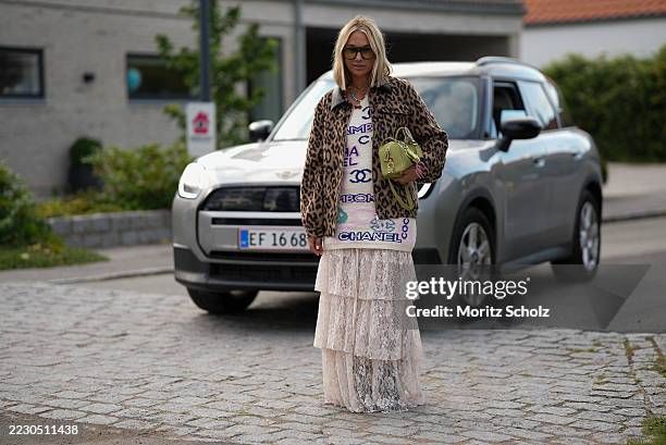 Karin Teigl, attending the Baum und Pferdgarten show during Copenhagen Fashion Week SS26, is seen wearing a leopard-print Beline jacket with a...