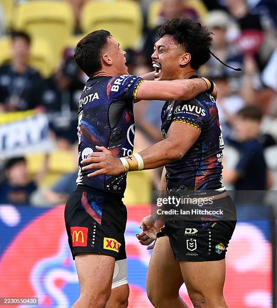 Jeremiah Nanai of the Cowboys celebrates after scoring a try during the round 24 NRL match between North Queensland Cowboys and Newcastle Knights at...