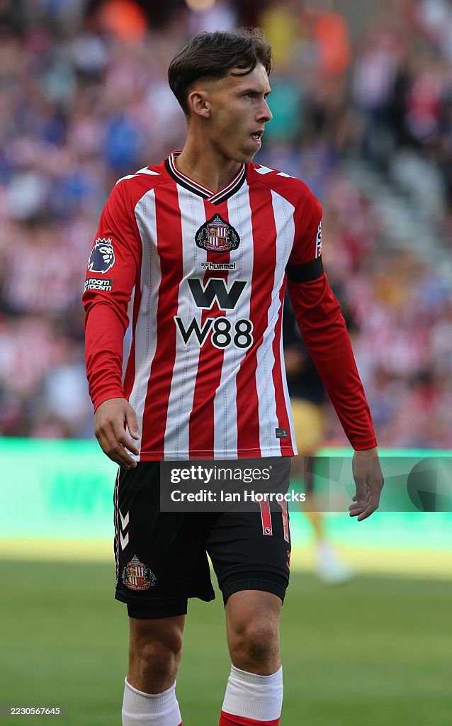 Criss Rigg Chris Rigg of Sunderland exits the pitch on the final whistle during ...