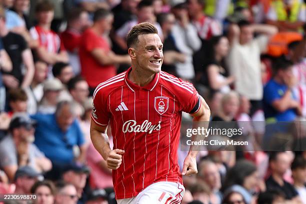 Chris Wood of Nottingham Forest celebrates scoring his team's third goal during the Premier League match between Nottingham Forest and Brentford at...