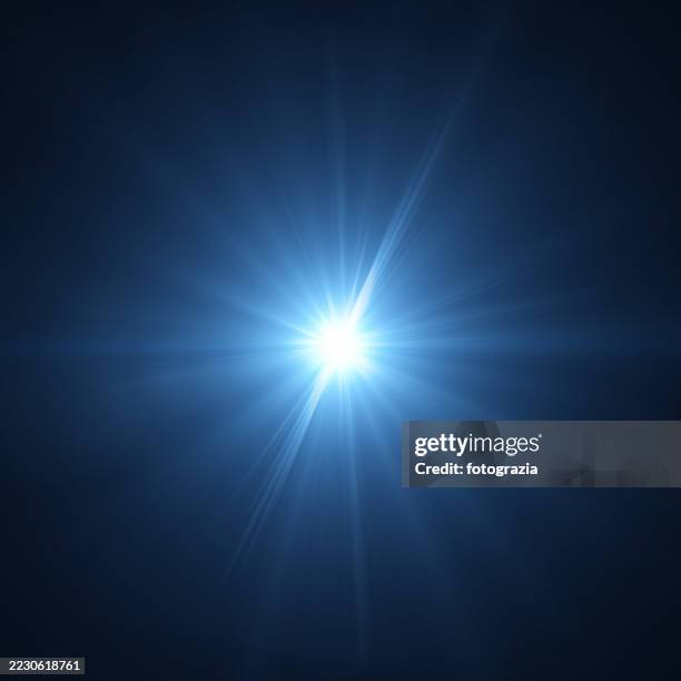blue light burst with radiating rays - allumer photos et images de collection