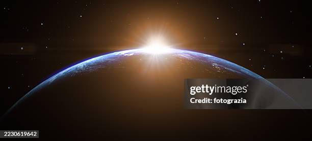 sunrise over earth from space - planet space stock pictures, royalty-free photos & images