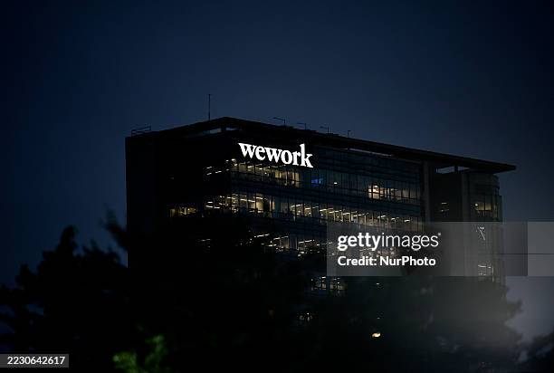 WeWork logo is seen at a WeWork office in a business district of Mumbai, India, on August 22, 2025.
