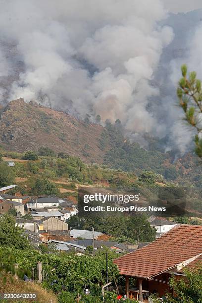 Forest fire approaches Quiroga, on 17 August, 2025 in Quiroga, Lugo, Galicia, Spain. The fire registered in Larouco "behaved in an explosive way" and...