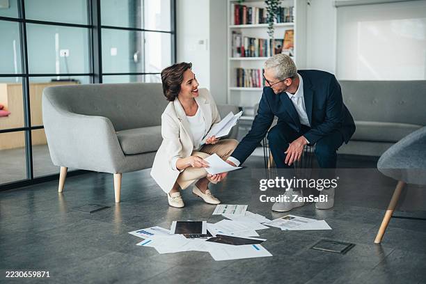 team problem-solving in action: managing unexpected challenges - important document stock pictures, royalty-free photos & images