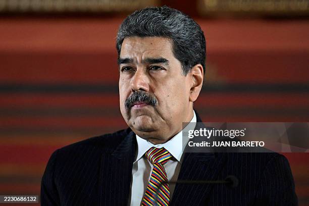Venezuela's President Nicolas Maduro looks on during a meeting at the National Assembly in Caracas on August 22, 2025. Venezuela's President Nicolás...
