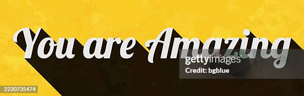 you are amazing - text with long shadow on textured yellow background - words of support and encouragement stock illustrations
