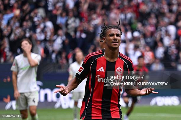 Frankfurt's French forward Jean-Matteo Bahoya celebrates scoring his team's second goal during the German first division Bundesliga football match...