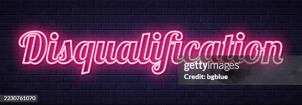 disqualification - glowing neon text on brick wall background - disqualification stock illustrations
