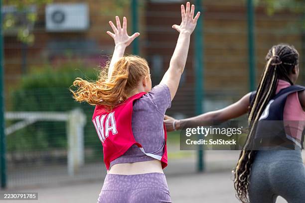 team tactics at work - netball stock pictures, royalty-free photos & images