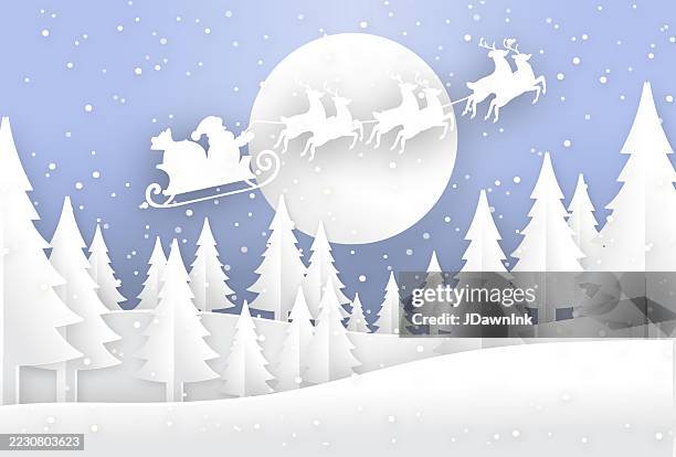 christmas paper sculpture snowing winter scene santa claus, sleigh and his reindeer flying in front of moon above trees - reindeer stock illustrations