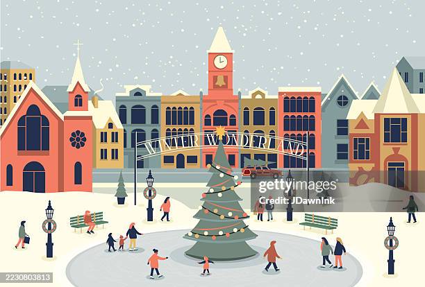 christmas small town square with downtown buildings christmas tree, ice skating rink. people skating and snowing winter scene christmas eve blue. - ice skater stock illustrations