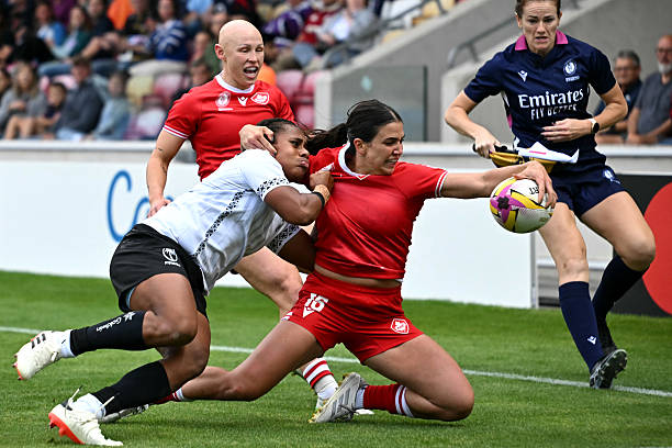 Canada's full back Julia Schell scores a try during the Women's Rugby World Cup pool B match between Canada and Fiji at York Community Stadium