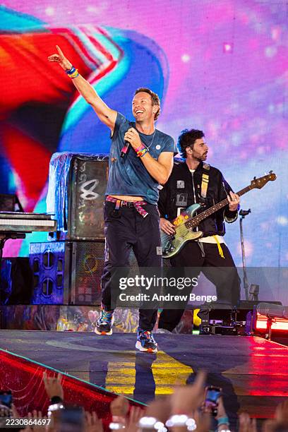 Chris Martin of Coldplay performs live on stage during their "Music of the Spheres" World Tour at Craven Park Stadium on August 18, 2025 in Hull,...