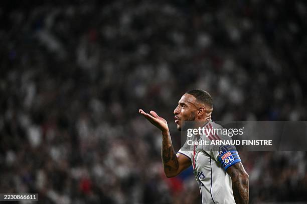 Lyon's French midfielder Corentin Tolisso celebrates after scoring a goal during the French L1 football match between Olympique Lyonnais and FC Metz...
