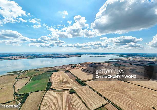 fields in the bright sunlight - patchwork landscape stock pictures, royalty-free photos & images