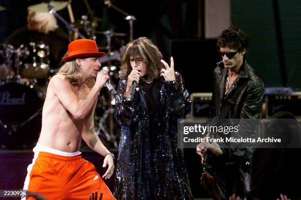 Kid Rock performing with Run DMC, Steven Tyler, and Joe Perry during the 1999 MTV Music Video Awards held at the Metropolitan Opera House, Lincoln...