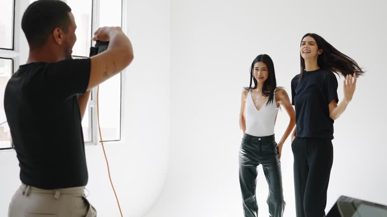 https://media.gettyimages.com/id/2230939005/video/photographer-taking-pictures-of-two-fashion-models-in-slow-motion.jpg?b=1&s=640x640&k=20&c=mfvSNcQOEHevNti1lH6chNUg2gTPeouvfpNH1BToptQ=