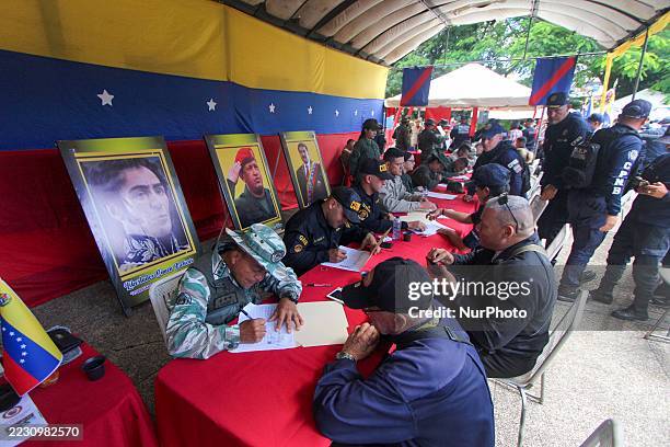 People register during a recruitment process in San Cristobal, Venezuela, on August 23, 2025. Venezuelan government authorities conduct recruitment...