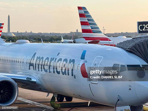 An American Airlines passenger plane is parked at a gate at Ronald Reagan Washington National Airport on August 24 in Arlington, Virginia.