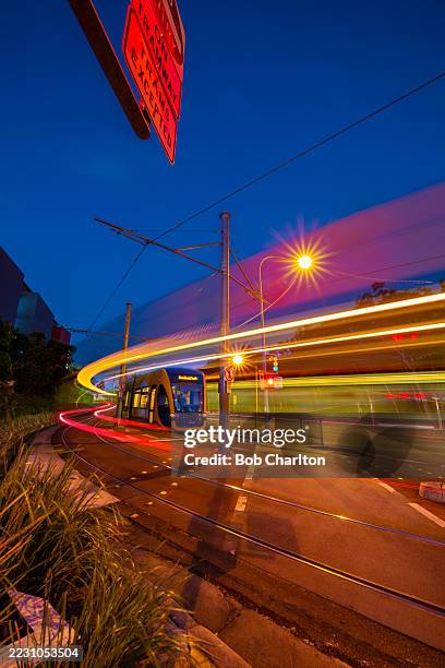 gold coast lightrail - electric train stock pictures, royalty-free photos & images