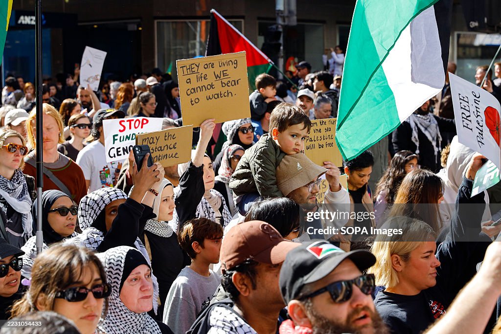 Sample Rally Placards Protesters hold placards during the rally. A nationwide rally for ...