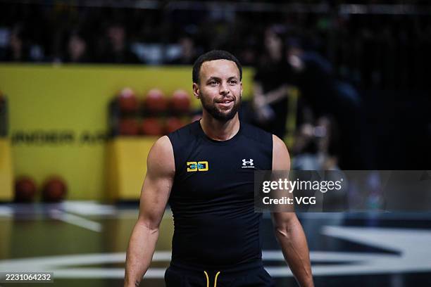 Star Stephen Curry offers coaching sessions for young players during his 2025 Curry Brand China Tour at the Chongqing International Expo Center on...
