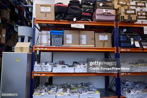 Different objects classified on shelves, in the Lost and Found office of the City Hall, on 20 August, 2025 in Madrid, Spain. The office is...
