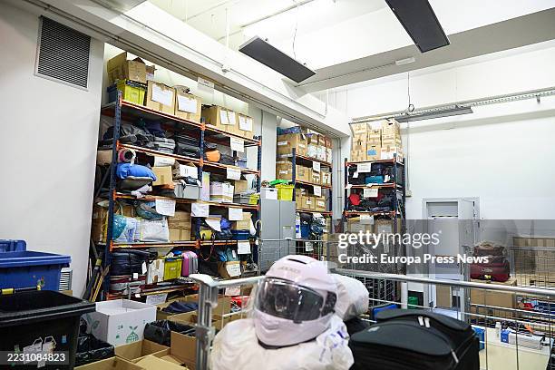 Different boxes and objects classified on shelves, in the Lost and Found office of the City Hall, on 20 August, 2025 in Madrid, Spain. The office is...