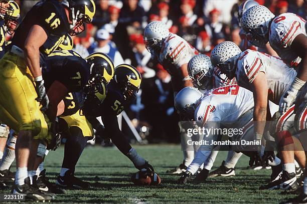 Ohio State and Michigan go head to head in Michigan's 31-23 victory over Ohio State at Michigan Stadium in Ann Arbor, Michigan.