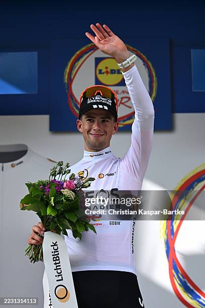 Samuel Watson of Great Britain and Team INEOS Grenadiers celebrates at podium as White Best Young Rider Jersey winner during the 40th Deutschland...