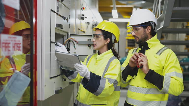 https://media.gettyimages.com/id/2231411859/video/engineers-check-a-control-panel-and-cabinet-ensuring-safety-and-efficiency-in-a-manufacturing.jpg?b=1&s=640x640&k=20&c=Jr_PEr-0b9ZiIeinCv-inUdDZHbAW247qgc24h14T5o=