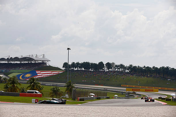 Sepang International Circuit, Sepang, Malaysia. Sunday 1 October 2017. Lewis Hamilton, Mercedes F1 W08 EQ Power+, leads Max Verstappen, Red Bull...