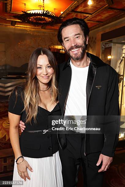 Kaley Cuoco and Tom Pelphrey seen at Sir Gary Oldman Hand and Footprint at TCL Chinese Theatre on August 22, 2025 in Hollywood, California.